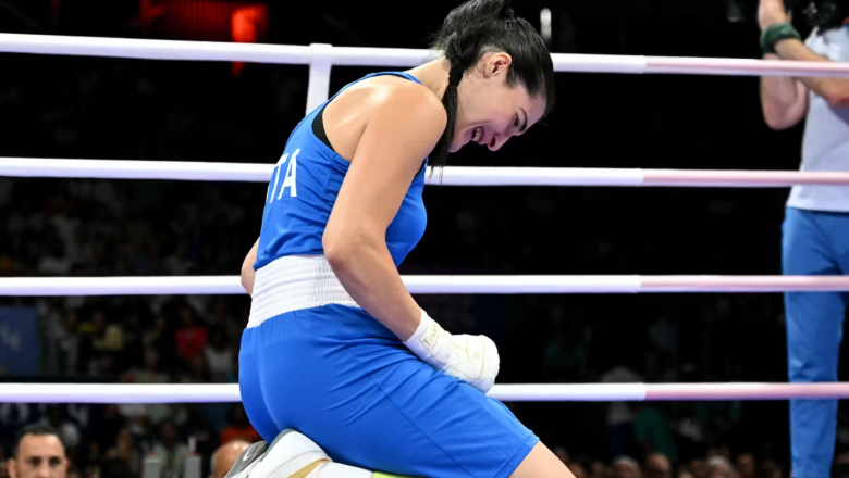 What did the Boxing female boxer give up in the Paris Olympic Games 2024 after the match? - Photo 2