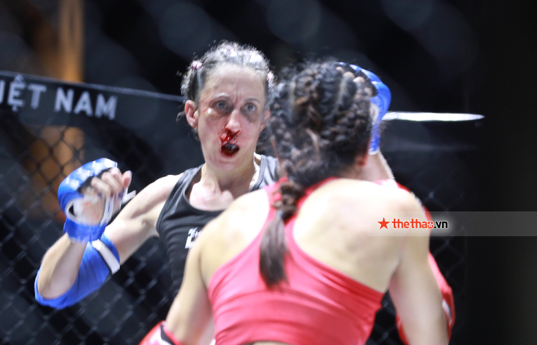 Female boxer wearing ao dai to share bruises after reaching the final of Lion Championship - Photo 3