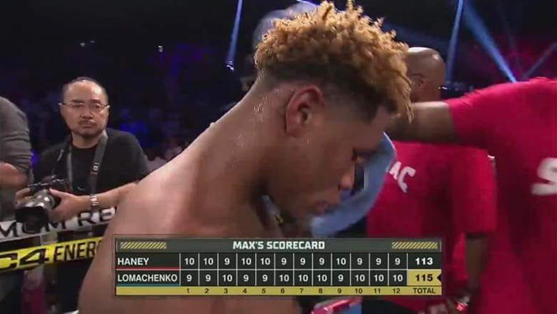 What are the referees in the match between Devin Haney and Lomachenko for scores? - Photo 2