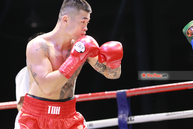 Truong Dinh Hoang defended, unified boxing belt at home - Photo 2