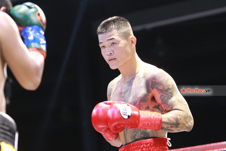 Truong Dinh Hoang defended, unified boxing belt at home - Photo 1