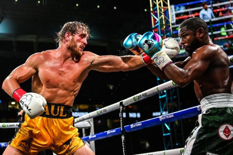 Daniel Cormier said: Logan Paul won Floyd Mayweather - Photo 2